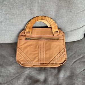 Vintage canvas handbag with wooden handles
